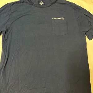 Converse navy blue t shirt with pocket.